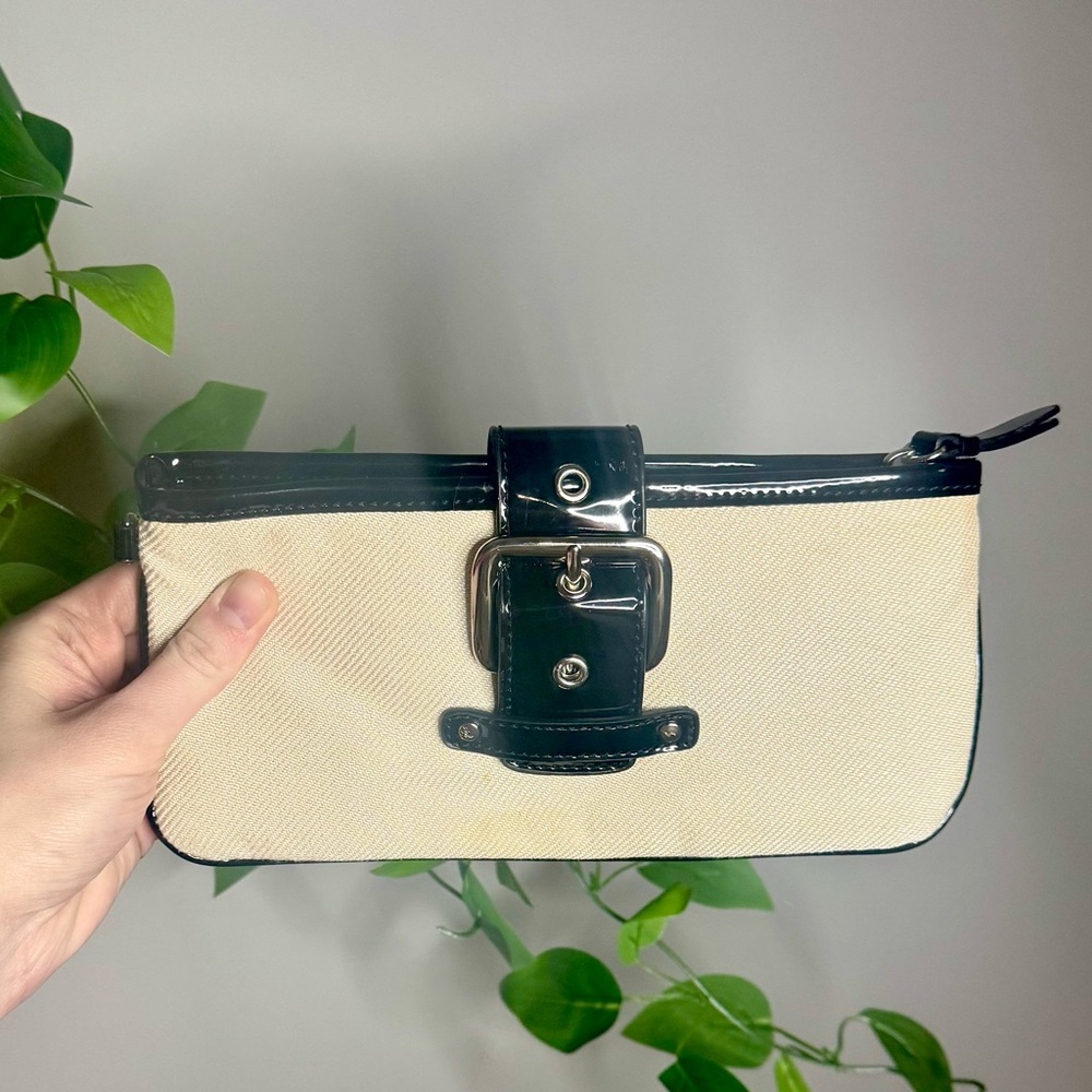 Ann Taylor Cream and Black faux leather clutch with buckle detail